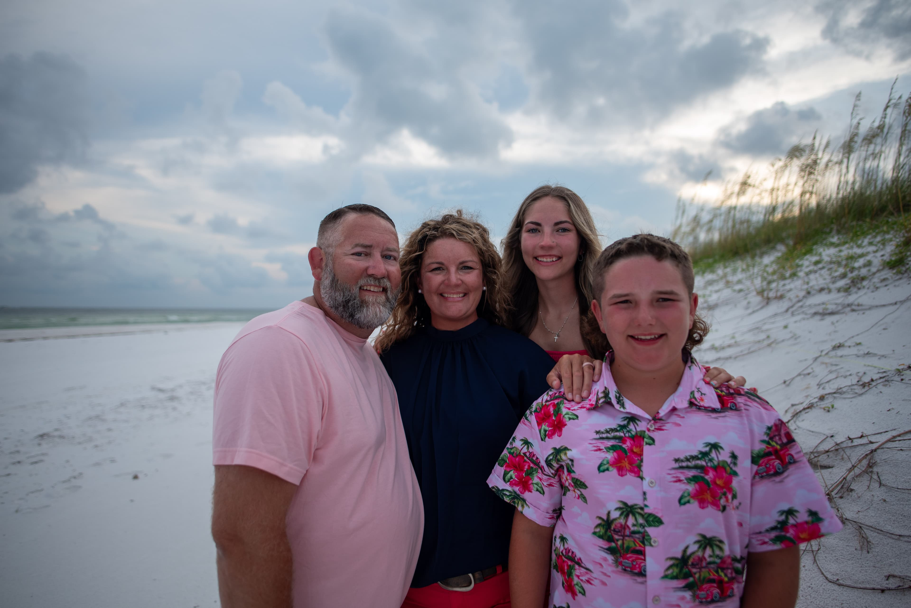 Candid family portrait on the beach